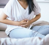 Woman having painful stomachache,Female suffering from abdominal